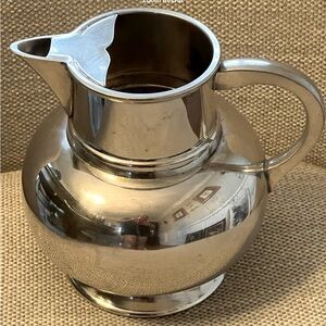 Vintage Sheffield Pewter Pitcher. England.  Holds 48oz. Measures (6 3/4”H X 7”W)